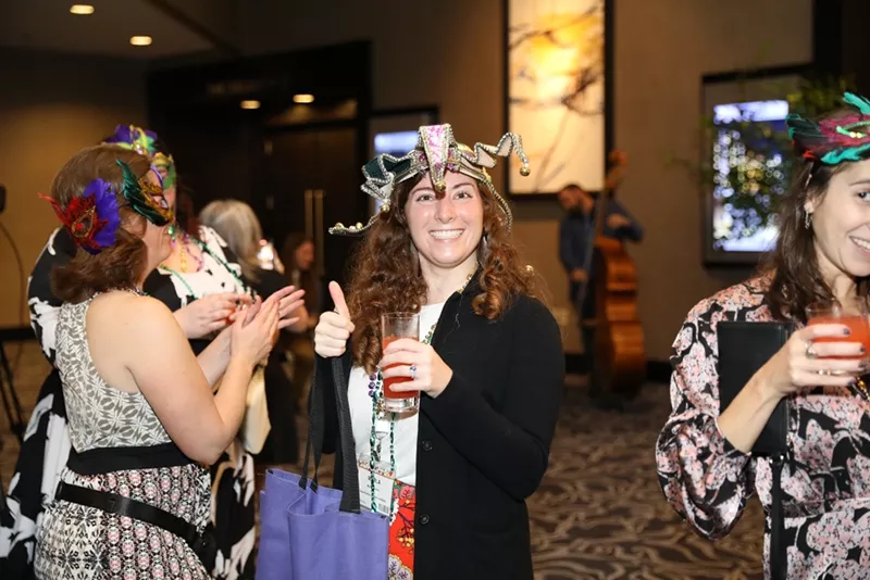 Smiling conference attendees