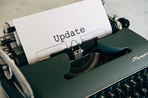 Typewriter with the word Update