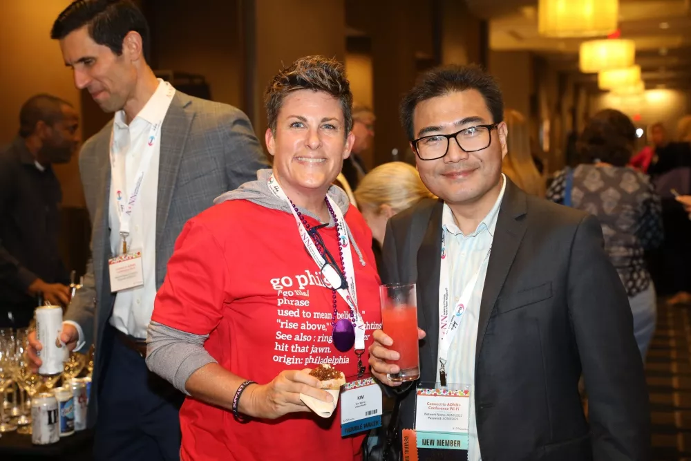 Smiling conference attendees