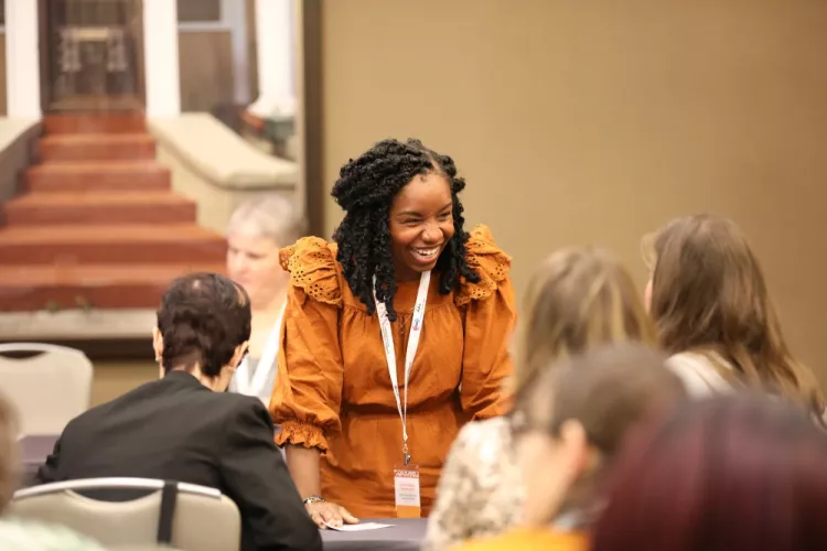 Smiling conference attendee